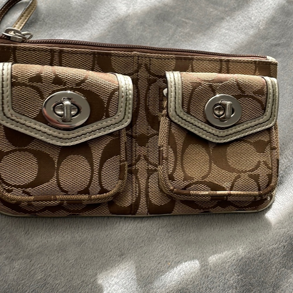 Coach tan and gold wristlet